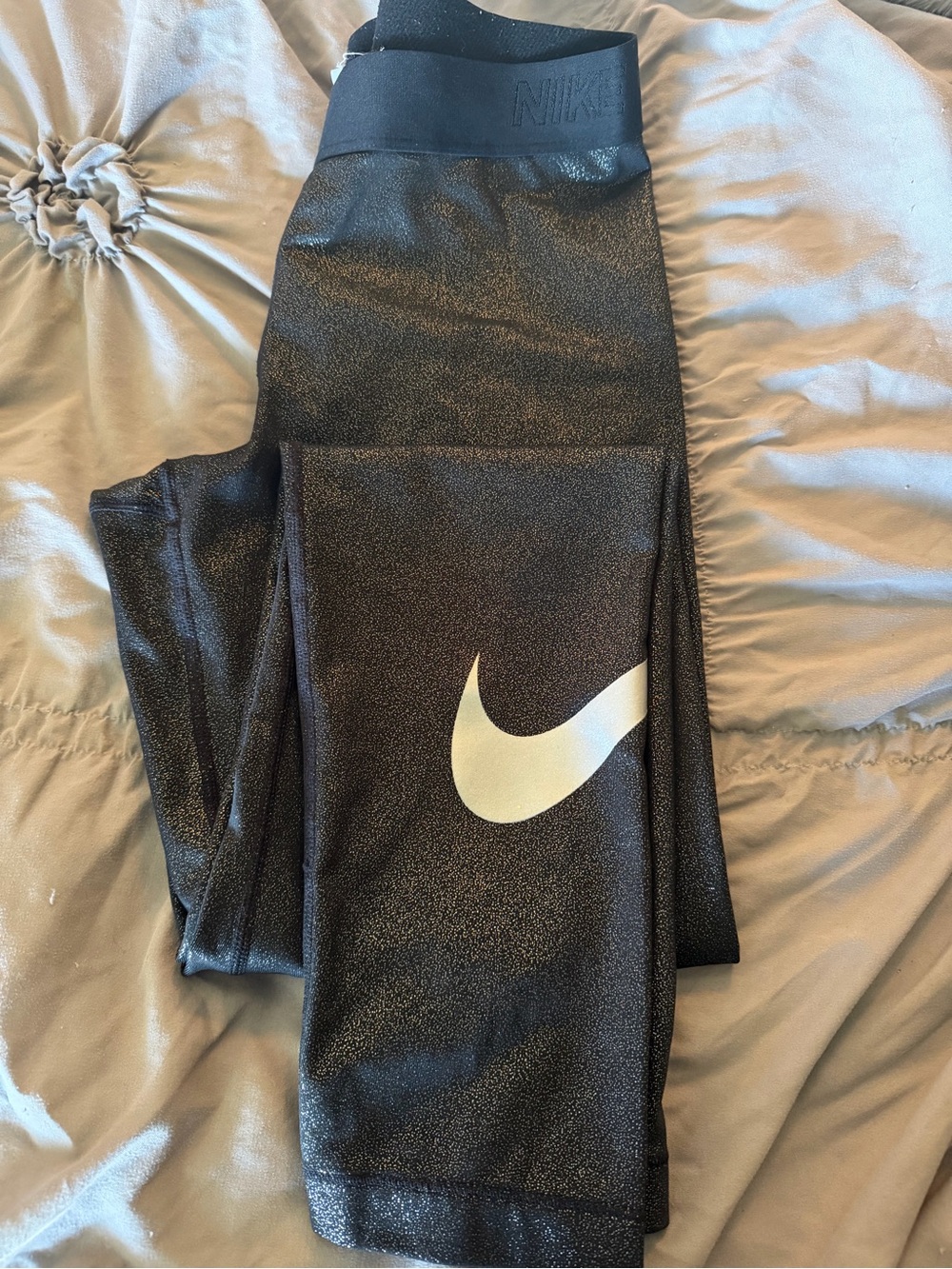 Nike women’s Black Leggings with White Swoosh